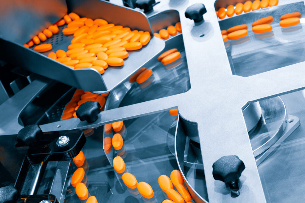 Pharmaceutical production line, production of tablets or vitamins manufacturing, tablet conveyor