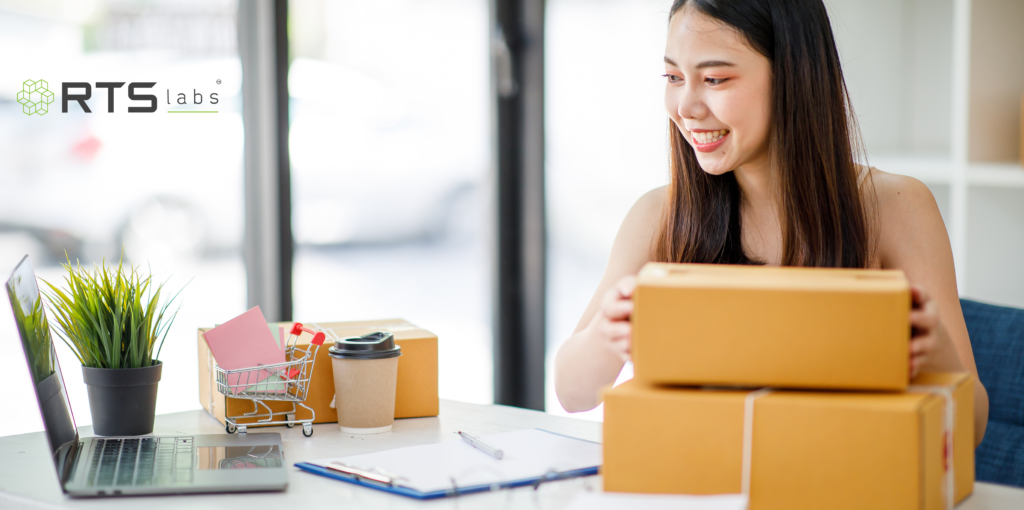 An Asian woman with several parcels running a thriving small business because she read the ai consulting practical guide for small business leaders.