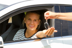 woman in a new car.