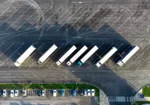 Aerial view of trucks parked in the parking lot. Directly above. Top down view