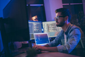 A man implementing web data collection in ai responsibly. He's attractive but with rather nerdy glasses but it's okay though.