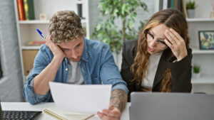 A man and woman having a hard time overcoming AI challenges.