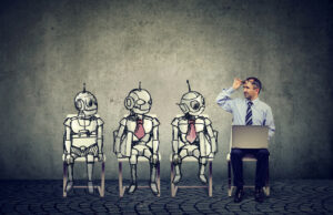 A man sitting next to illustrated robots representing custom AI solutions.