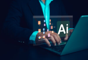 Man on computer and AI icon popping up. He's devising an effective AI strategy.